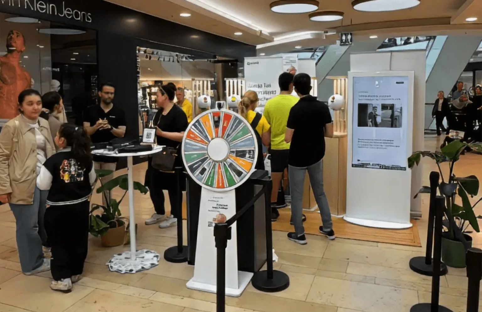 Visitors at a World stand in a shopping centre